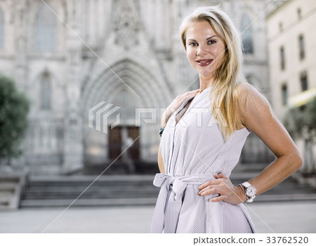 cheerful woman in the dress at the street 33762520