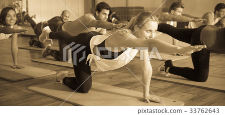 People stretching in dance hall 33762643