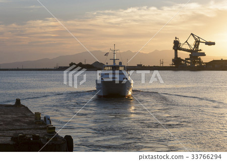 High-speed ship leaving port High-speed ship leaving port 33766294
