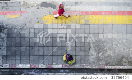 On street walk in top view man and woman 33766404