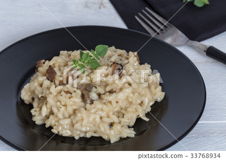 Truffle Risotto with marjoram on a plate 33768934
