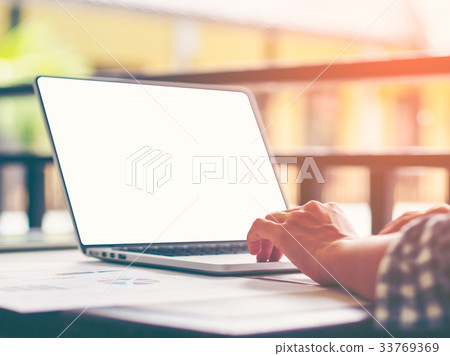 business woman laptop on wood table  33769369