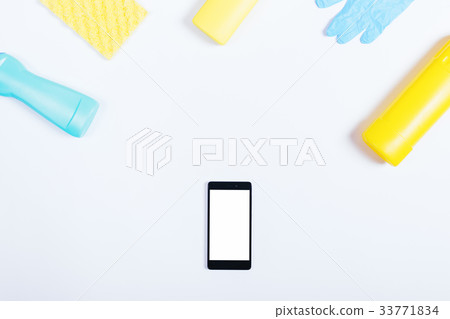 Mobile phone, yellow and blue bottle 33771834