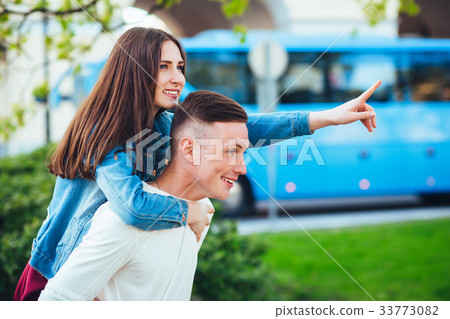 Young couple having fun in the city. Young couple having fun in the city. 33773082