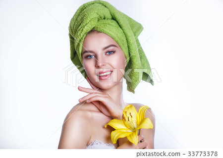 Spa Girl's face . Young beautiful woman after bath 33773378