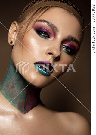 Beautiful girl with creative colorful makeup 33773958