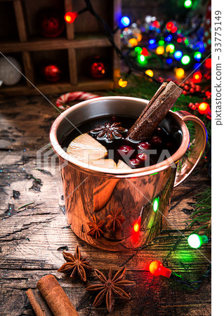 Mulled wine in copper mug. 33775149