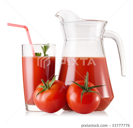 Tomato juice in a glass and a decanter Tomato juice in a glass and a decanter 33777776