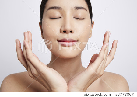 portrait of a beautiful woman with a mooth skin 33778867