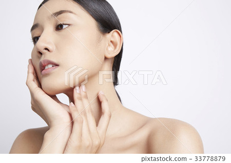 portrait of an Asian woman in a white background 33778879