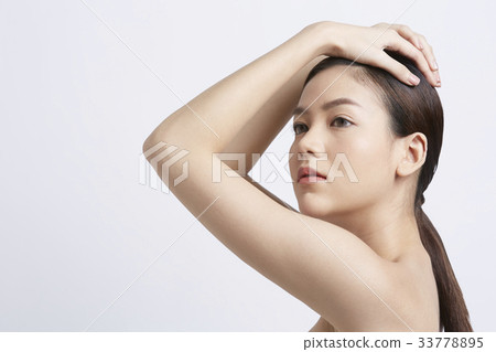 picture of an Asian model posing in a white background 33778895