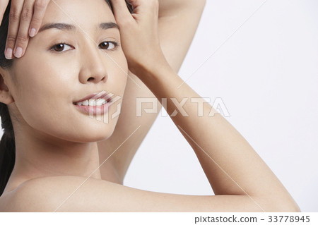 portrait of a beautiful girl posing and smiling portrait of a beautiful girl posing and smiling 33778945