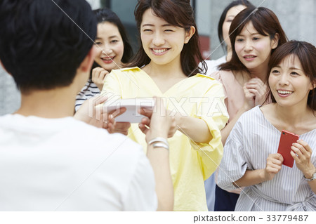 Fan woman getting a sign 33779487