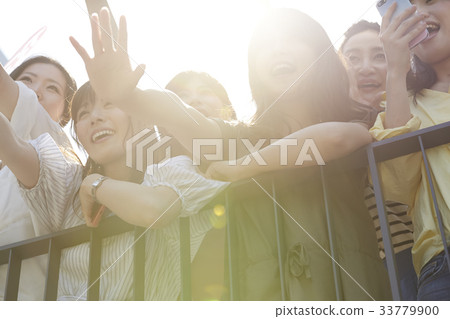 Women participating in the event 33779900