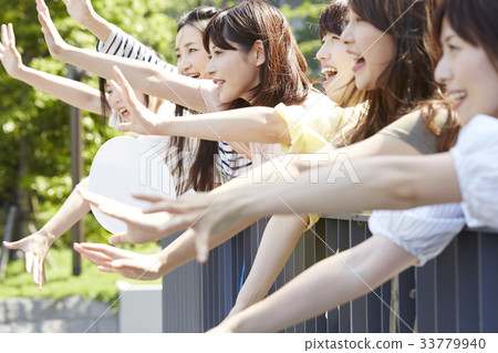 Women participating in the event Women participating in the event 33779940