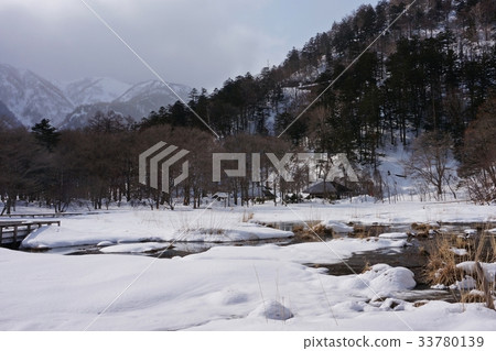 The promenade of the Yunohira wetlands in winter and Nikko mountains The promenade of the Yunohira wetlands in winter and Nikko mountains 33780139