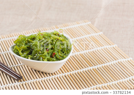 wakame seaweed salad in a ceramic bowl wakame seaweed salad in a ceramic bowl 33782134