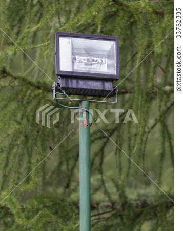 Security light in a forest 33782335