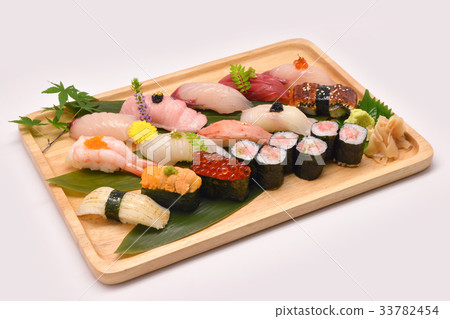 Mixed sushi set in brown wooden tray 33782454