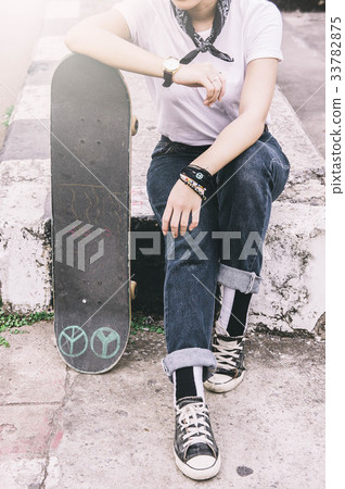 Asian Teen Girl With Skateboard style in outdoors 33782875