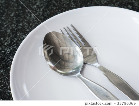 Old sliver spoon and fork. Old sliver spoon and fork. 33786369