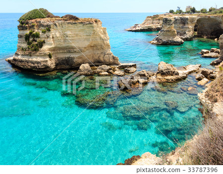 Faraglioni at Torre Sant Andrea, Italy 33787396