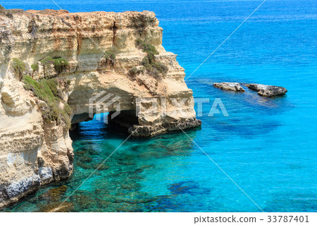 Faraglioni at Torre Sant Andrea, Italy 33787401