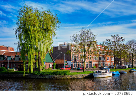 Boats, houses and canal. Harlem, Netherlands 33788693
