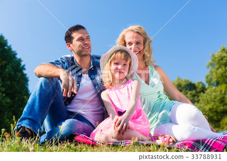 Family photo with father, mother and daughter in Family photo with father, mother and daughter in 33788931