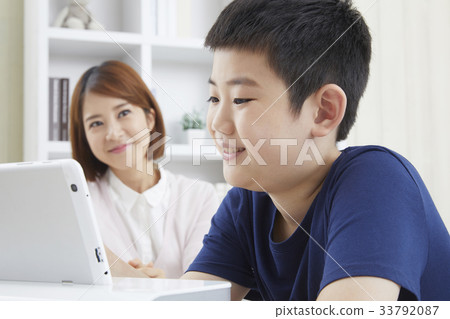 Teacher, elementary school student, mother, education, tutoring, tutor Teacher, elementary school student, mother, education, tutoring, tutor 33792087