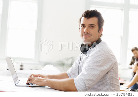 Young businessman in office 33794833