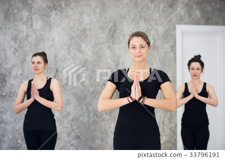 Young sportive trio group of girls are practicing Young sportive trio group of girls are practicing 33796191