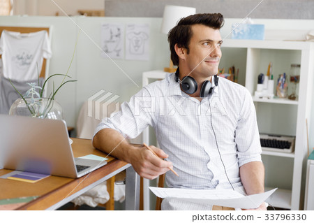 Portrait of young man wearing casual in office Portrait of young man wearing casual in office 33796330