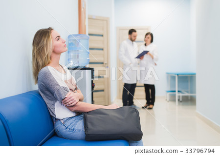 Young woman filling nervous sitting at hospital 33796794