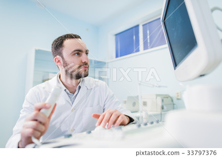 Portrait of a thinking doctor near sceen of Portrait of a thinking doctor near sceen of 33797376