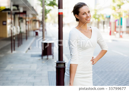 Portrait of business woman smiling outdoor Portrait of business woman smiling outdoor 33799677