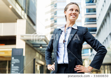 Portrait of business woman smiling outdoor 33800650