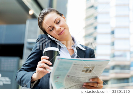 Portrait of business woman smiling outdoor Portrait of business woman smiling outdoor 33801150