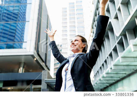 Portrait of business woman smiling outdoor Portrait of business woman smiling outdoor 33801336