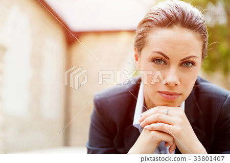 Portrait of business woman smiling outdoor 33801407
