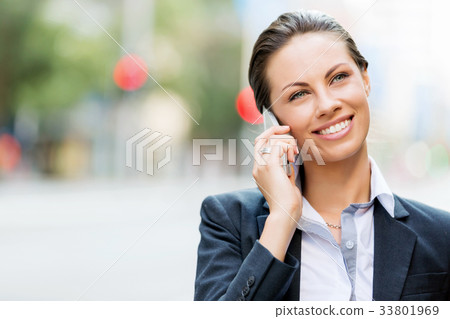 Portrait of business woman smiling outdoor Portrait of business woman smiling outdoor 33801969