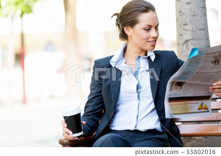 Portrait of business woman smiling outdoor 33802016