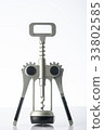 Corkscrew (wine opener) isolated on white. 33802585