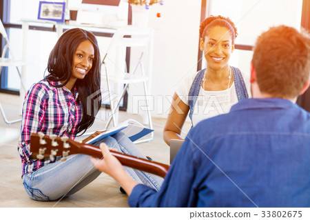 Young office workers or students Young office workers or students 33802675