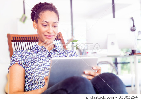 Portrait of smiling afro-american office worker in offfice Portrait of smiling afro-american office worker in offfice 33803254