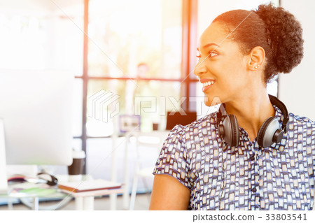 Portrait of smiling afro-american office worker in offfice Portrait of smiling afro-american office worker in offfice 33803541
