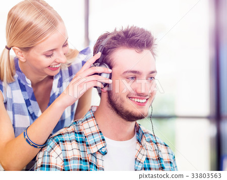 Two young people in office Two young people in office 33803563