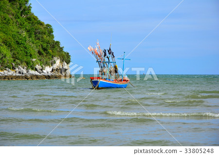 One fisherman boat in a sea in Thailand. One fisherman boat in a sea in Thailand. 33805248