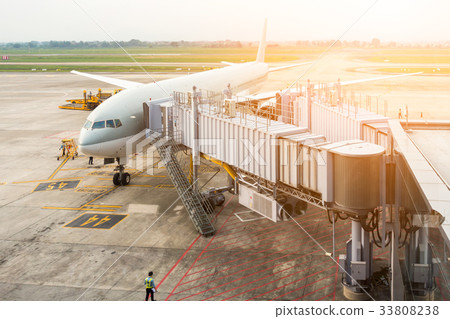 Aircraft being being maintenance at gate terminal Aircraft being being maintenance at gate terminal 33808238