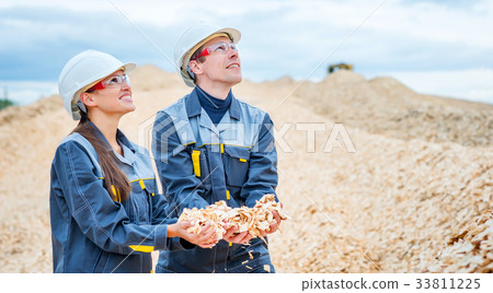 Paper mill factory workers 33811225